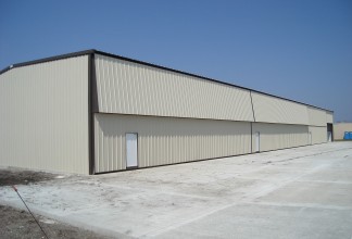 An airport hangar at Algona Municipal Airport in Algona, Iowa, constructed by Holland Contracting in April 2007.